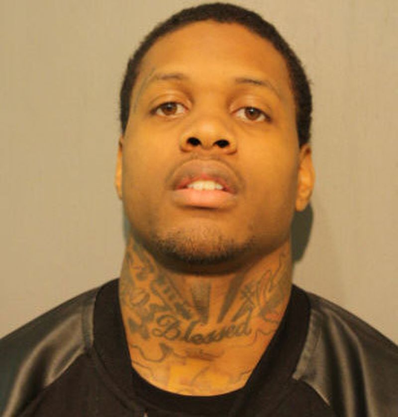 Lil Durk, 22, whose real name is Durk Banks, was arrested after Chicago gang officers went to a home in Orland Park about 5 a.m. He was charged with weapons violations.